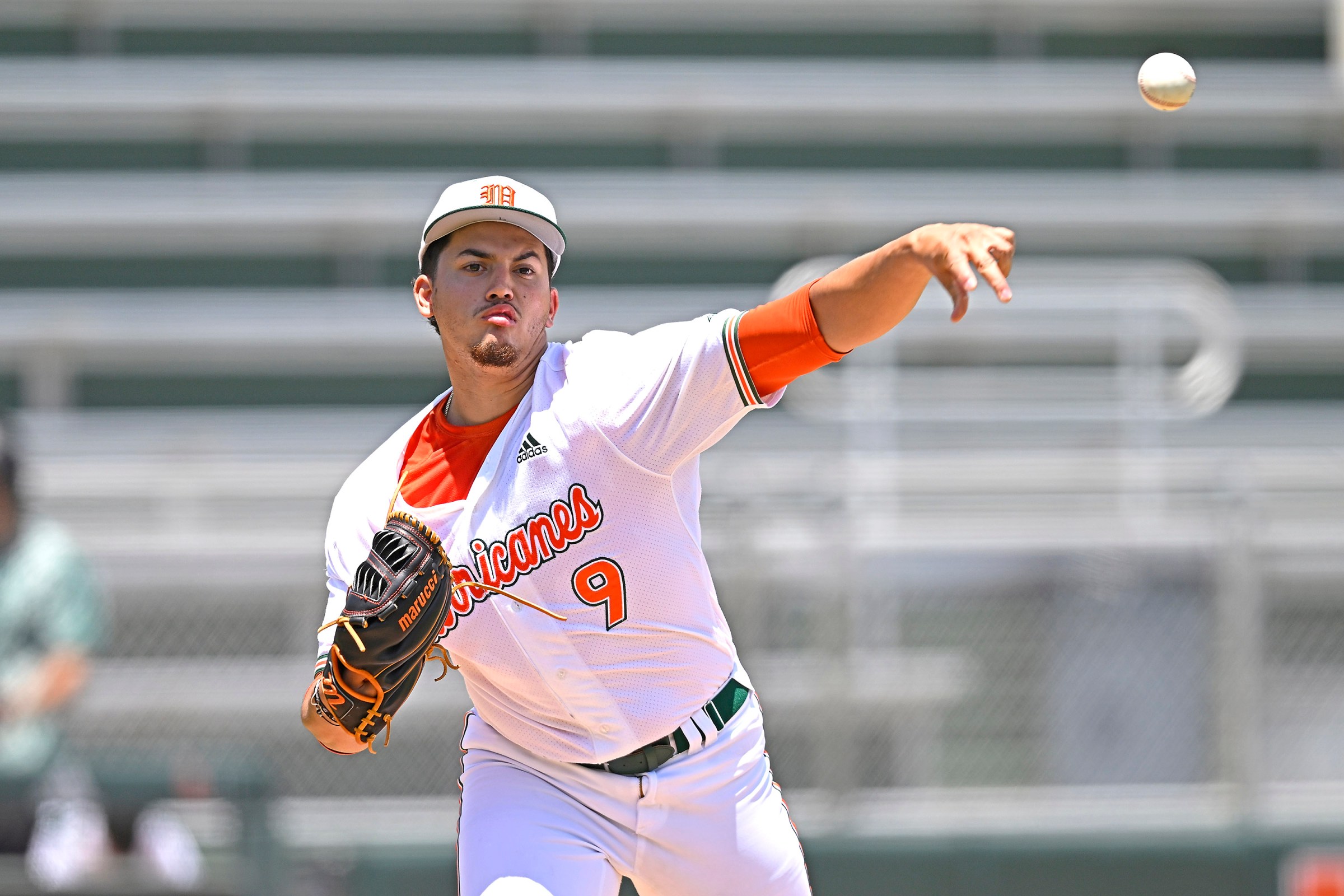 CORAL GABLES, FL - MAY 04: Miami left-handed pitcher Herick Hernandez (9) throws to first base in the third inning as the Miami Hurricanes faced the BYU Cougars on May 4, 2024, at Mark Light Field at Alex Rodriguez Park in Coral Gables, Florida. (Photo by Samuel Lewis/Icon Sportswire via Getty Images)