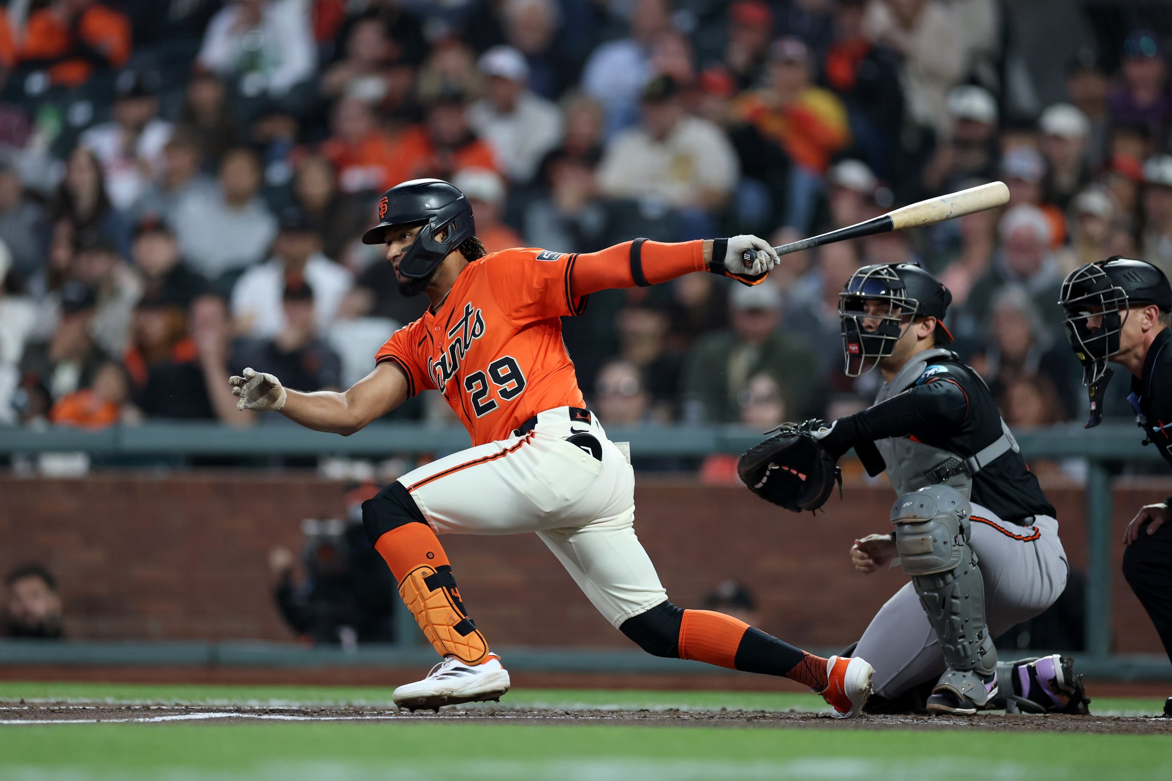 SAN FRANCISCO, CALIFORNIA - AUGUST 29: Luis Matos #29 of the San Francisco Giants hits a single that scored two runs against the Baltimore Orioles in the first inning at Oracle Park on August 29, 2025 in San Francisco, California. (Photo by Ezra Shaw/Getty Images)