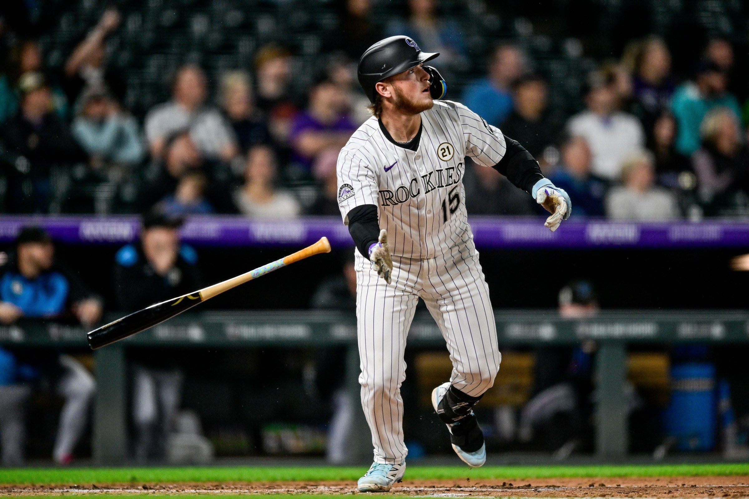 DENVER, CO - SEPTEMBER 16: Colorado Rockies catcher Hunter Goodman (15) hits a long fly ball before reaching second base on a fielding error in the fourth inning during a game between the Miami Marlins and the Colorado Rockies at Coors Field on September 16, 2025 in Denver, Colorado. (Photo by Dustin Bradford/Icon Sportswire via Getty Images)
