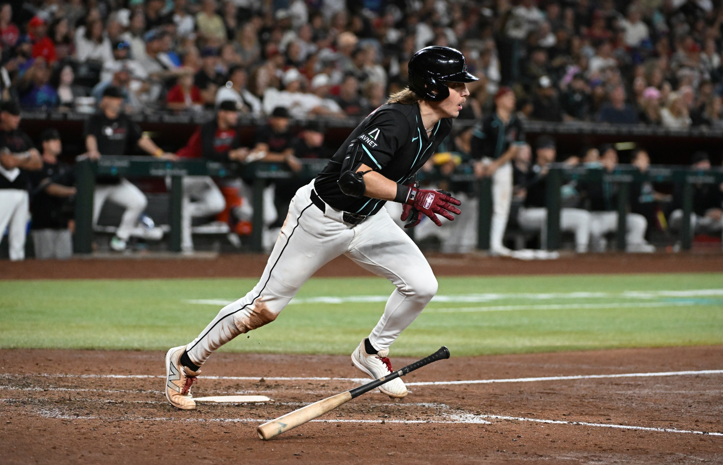 PHOENIX, ARIZONA - SEPTEMBER 20: Jake McCarthy #31 of the Arizona Diamondbacks runs out of the batters box against the Philadelphia Phillies at Chase Field on September 20, 2025 in Phoenix, Arizona. (Photo by Norm Hall/Getty Images)