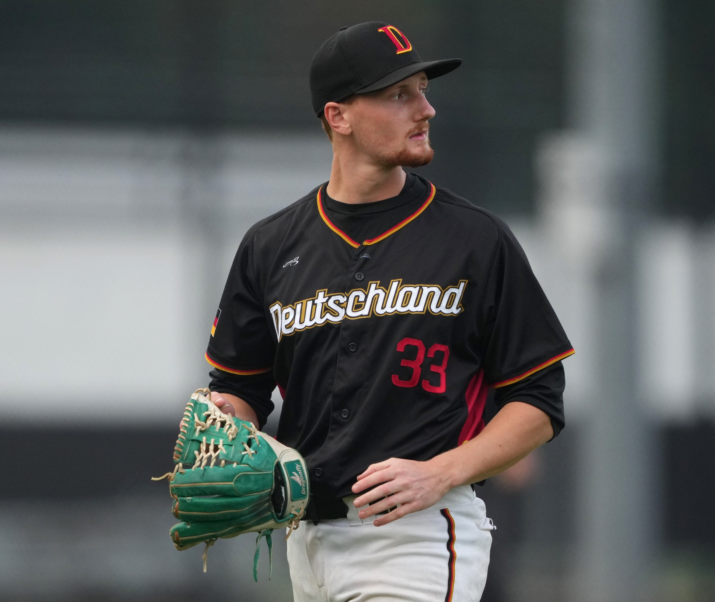 ROTTERDAM, NETHERLANDS - SEPTEMBER 27: Philipp Kleehaupt #33 of Germany looks on after ending the seventh inning during the 5-6 place ranking game between Germany and Great Britain in the Baseball European Championship at Neptunus Familiestadion on September 27, 2025 in Rotterdam, Netherlands. (Photo by Alex Bierens de Haan/Getty Images)