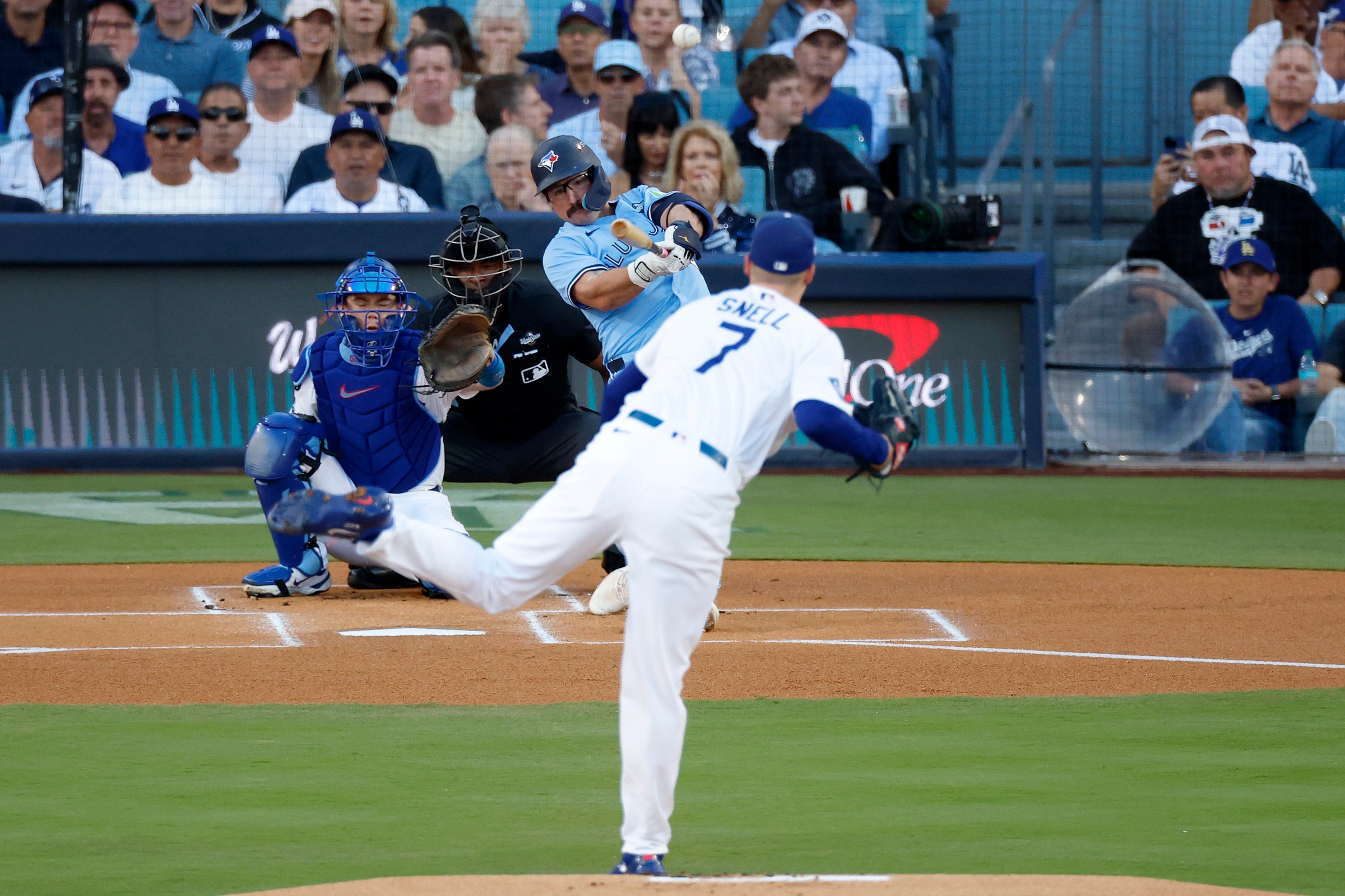 LOS ANGELES, CALIFORNIA - OCTOBER 29: Davis Schneider #36 of the Toronto Blue Jays hits a home run against the Los Angeles Dodgers during the first inningin game five of the 2025 World Series at Dodger Stadium on October 29, 2025 in Los Angeles, California. (Photo by Harry How/Getty Images)