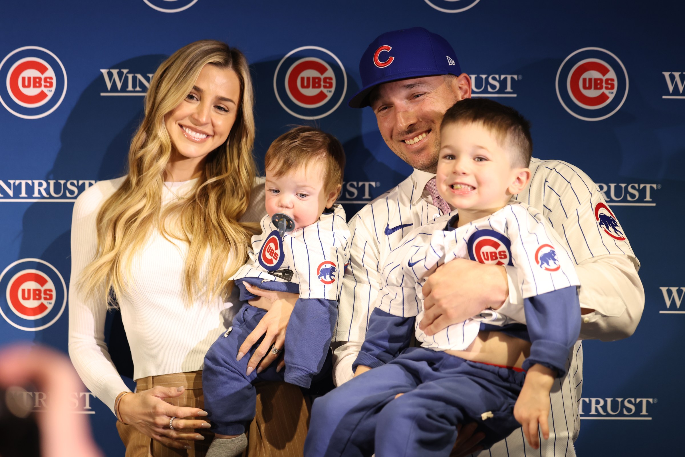 CHICAGO, ILLINOIS - JANUARY 15: Newly acquired Chicago Cubs player Alex Bregman poses for a picture with his family after a press conference at Wrigley Field on January 15, 2026 in Chicago, Illinois. (Photo by Geoff Stellfox/Getty Images)