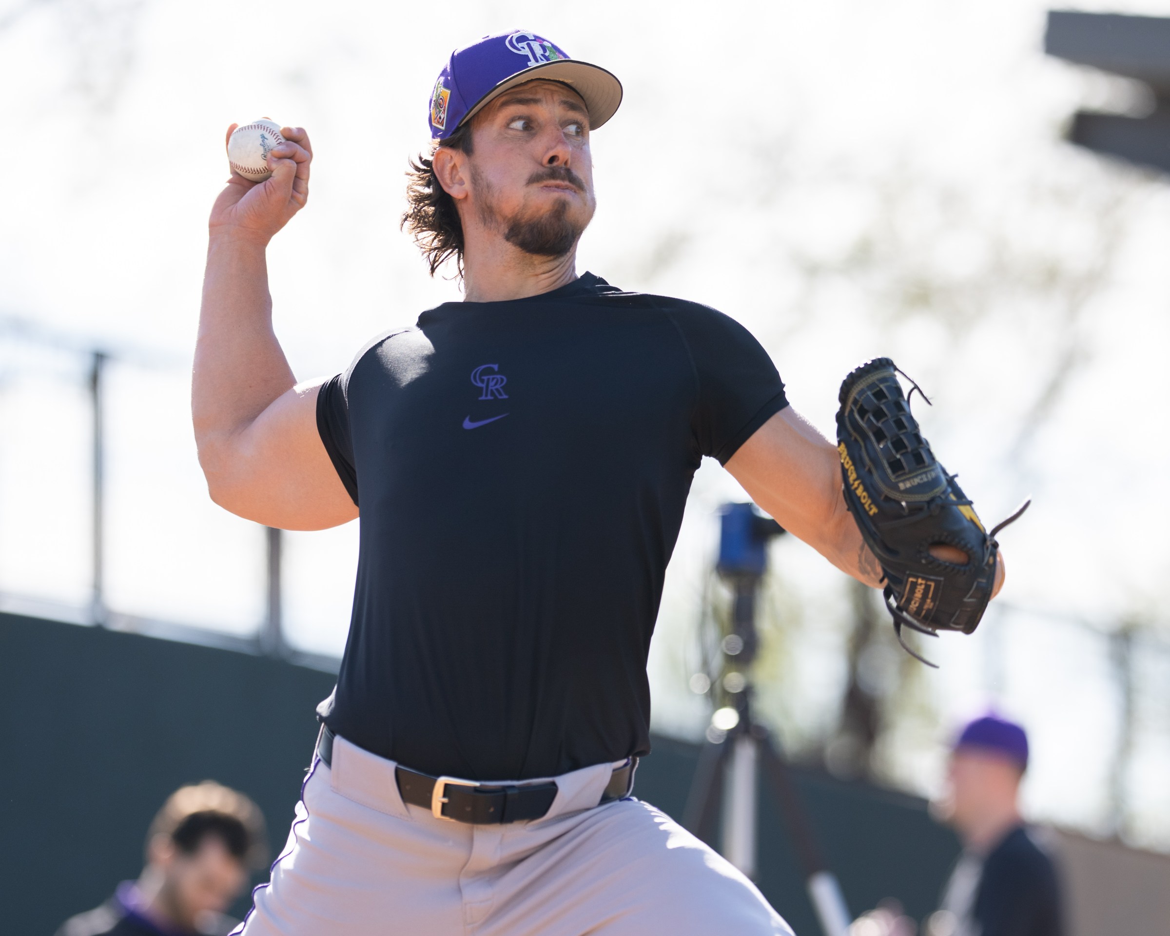 SCOTTSDALE, ARIZONA - FEBRUARY 10: Michael Lorenzen #24 of the Colorado Rockies delivers a pitch during a bullpen session at Salt River Fields at Talking Stick on February 10, 2026 in Scottsdale, Arizona. (Photo by Kyle Cooper/Colorado Rockies/Getty Images)