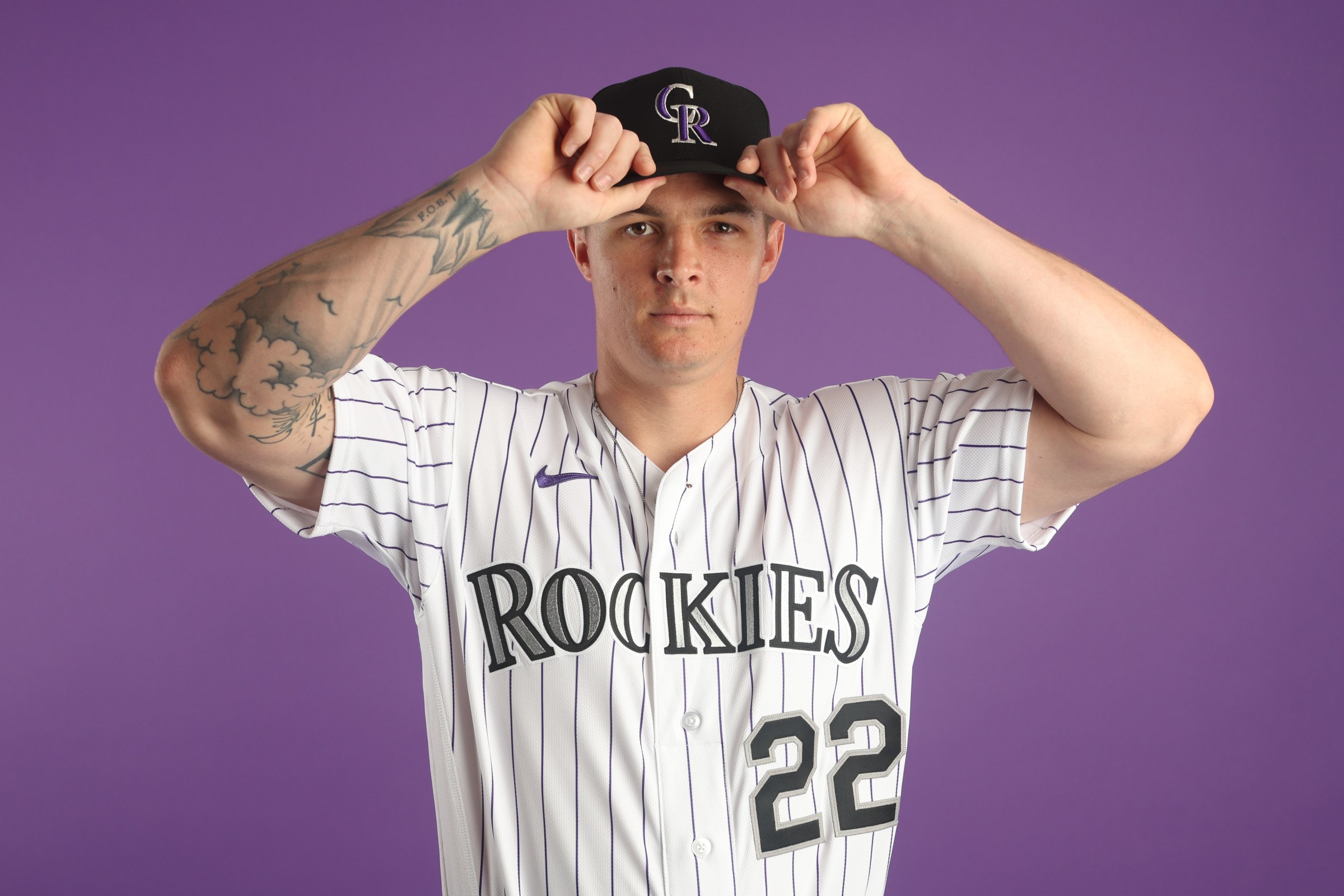 SCOTTSDALE, ARIZONA - FEBRUARY 18: Mickey Moniak #22 of the Colorado Rockies poses for a portrait during photo day at Salt River Fields at Talking Stick on February 18, 2026 in Scottsdale, Arizona. (Photo by Jeremy Chen/Getty Images)