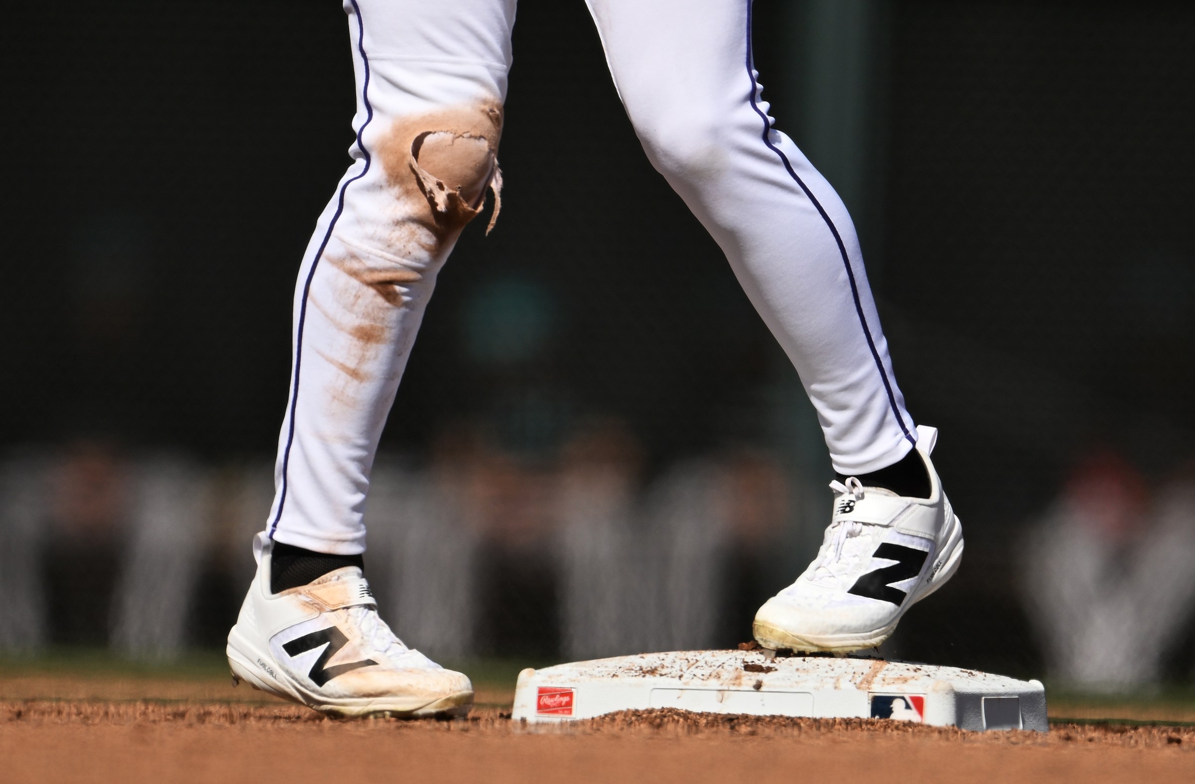 SCOTTSDALE, AZ - FEBRUARY 20: Colorado Rockies outfielder, Jake McCarthy tore his pants sliding into second base during the first 2026 spring training game at Salt River Field at Talking Stick in Scottsdale, Arizona on February 20, 2026. The Arizona Diamondbacks went onto beat the Colorado Rockies 3-2. (Photo by RJ Sangosti/MediaNews Group/The Denver Post via Getty Images)