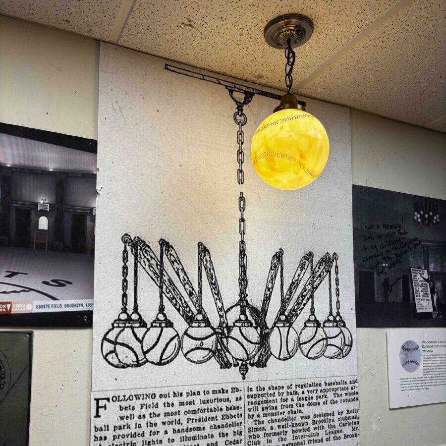 The last known baseball-shaped lamp from Ebbets Field is seen on display at the National Ballpark Museum in Denver, Colorado. (Travis Schlepp/Dodgers Nation)