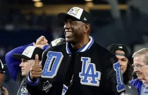 How Magic Johnson turned $40m NBA earnings into $1bn empire including Dodgers