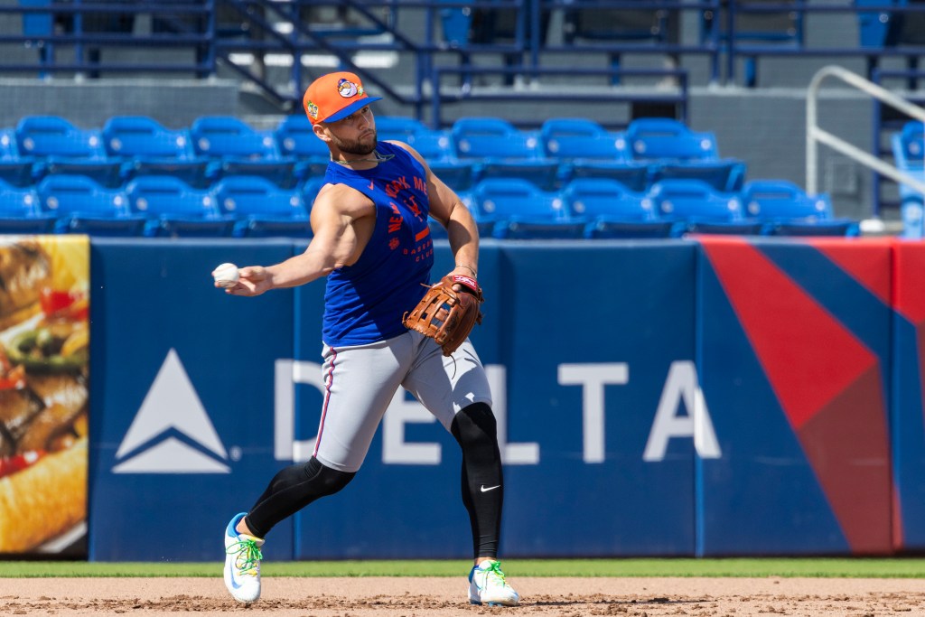 Bo Bichette fields grounders at third base during Spring Training.
