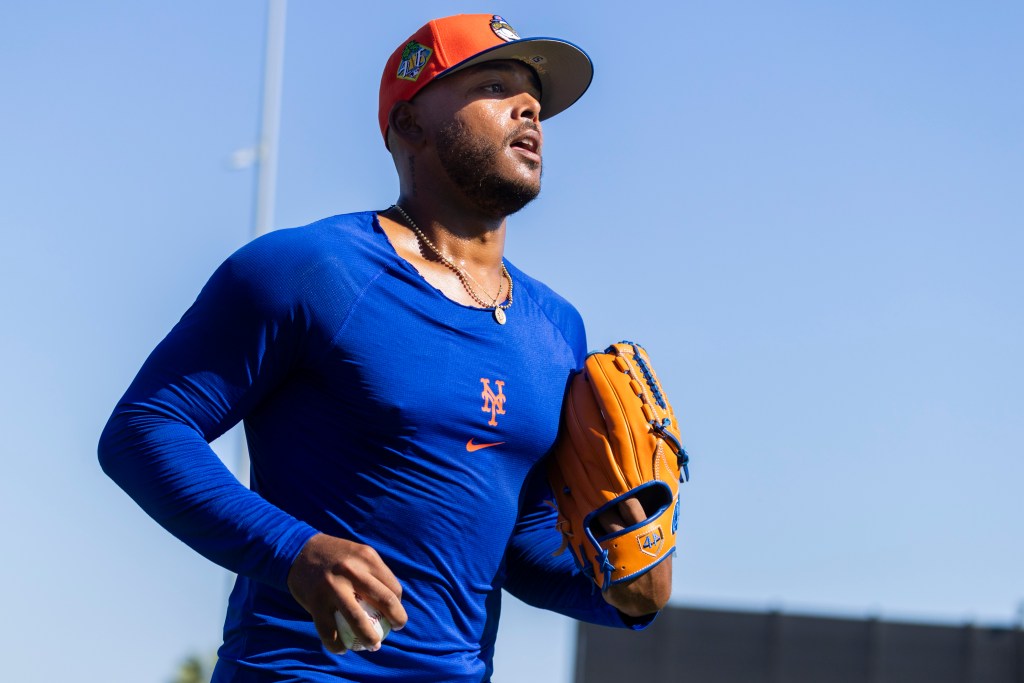 New York Mets Pitcher Freddy Peralta jogging during spring training.