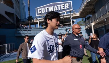 Los Angeles Dodgers two-way player Shohei Ohtani arrives to talk to reporters during DodgerFest at Dodger Stadium in Los Angeles, Saturday, Jan. 31, 2026. (AP Photo/Jae C. Hong)