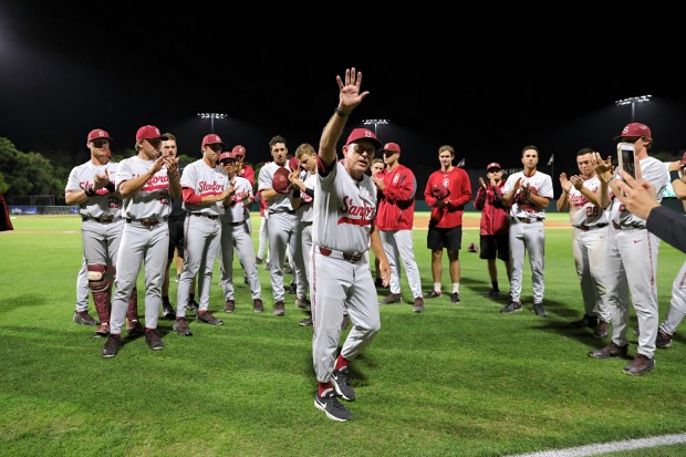 Stanford head coach Mark Marquess steps out of the dugout to acknowledge the crowd at Sunken Diamond after the Cardinal was eliminated from the postseason with a 4-2 loss to Cal State Fullerton in a NCAA Regional on Saturday, June 3, 2017. This was the last game of a 41-year career at the helm for Marquess, who announced his intention to retire the previous summer. (Bob Drebin / ISI Photos)