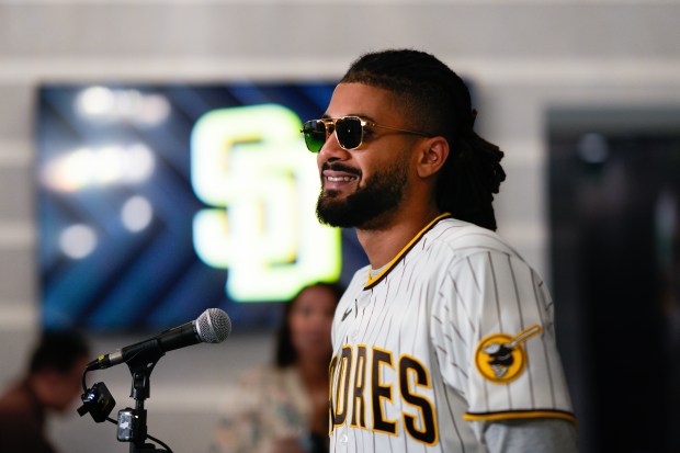 Fernando Tatis Jr. talks to the media at Padres  FanFest. (Nelvin C. Cepeda / The San Diego Union-Tribune)
