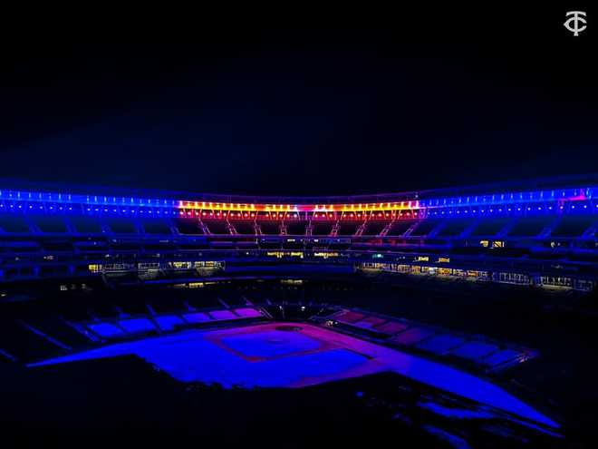 Minnesota Twins honor Carter Johnson with blue and yellow lights minnesota twins honor carter johnson with blue and yellow lights