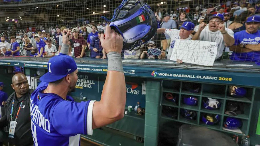 Vinnie Pasquantino celebrates with fans after defeating the United States at Daikin Park.