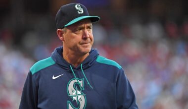 Aug 19, 2025; Philadelphia, Pennsylvania, USA;  Seattle Mariners manager Dan Wilson (6) walks to the dugout against the Philadelphia Phillies at Citizens Bank Park. Mandatory Credit: Eric Hartline-Imagn Images