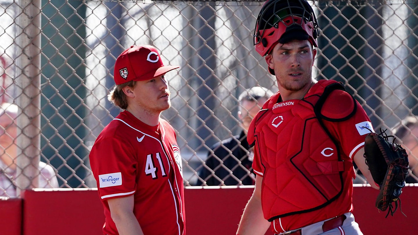 Cincinnati Reds pitcher Andrew Abbott (41) and Cincinnati Reds catcher Tyler Stephenson (37)