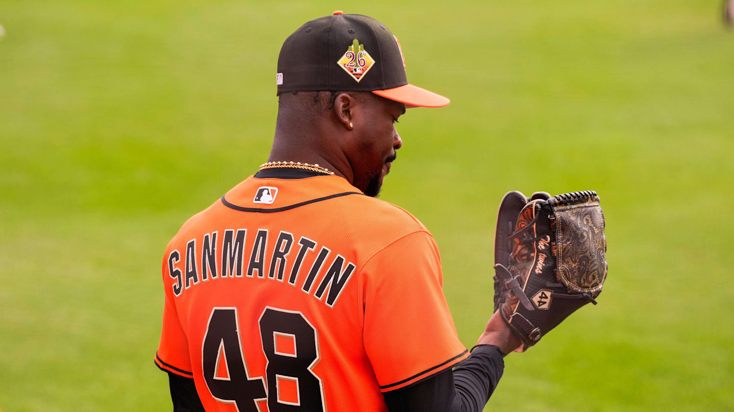 Feb 16, 2026; Scottsdale, AZ, USA; San Francisco Giants pitcher Reiver Sanmartin looks at his glove during workouts at Scottsdale Stadium in Scottsdale, Arizona.  Mandatory Credit: Arianna Grainey-Imagn Images