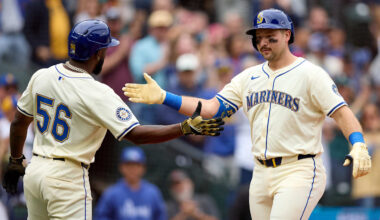 Sep 14, 2025; Seattle, Washington, USA;  Seattle Mariners catcher Cal Raleigh (29) is greeted by left fielder Randy Arozarena (56) on his two-run home run off in the first inning  against the Los Angeles Angels at T-Mobile Park. Mandatory Credit: John Froschauer-Imagn Images