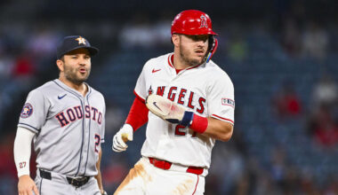 Sep 27, 2025; Anaheim, California, USA; Los Angeles Angels designated hitter Mike Trout (27) runs to second base against Houston Astros second baseman Jose Altuve (27) during the first inning at Angel Stadium. Mandatory Credit: Jonathan Hui-Imagn Images