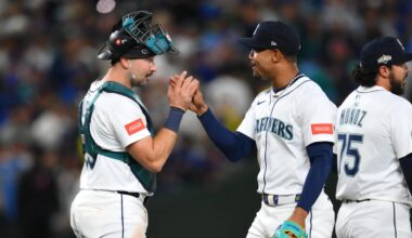 Oct 5, 2025; Seattle, Washington, USA; Seattle Mariners center fielder Julio Rodriguez (44) and catcher Cal Raleigh (29) celebrate after defeating the Detroit Tigers in game two of the ALDS round for the 2025 MLB playoffs at T-Mobile Park. Mandatory Credit: Steven Bisig-Imagn Images