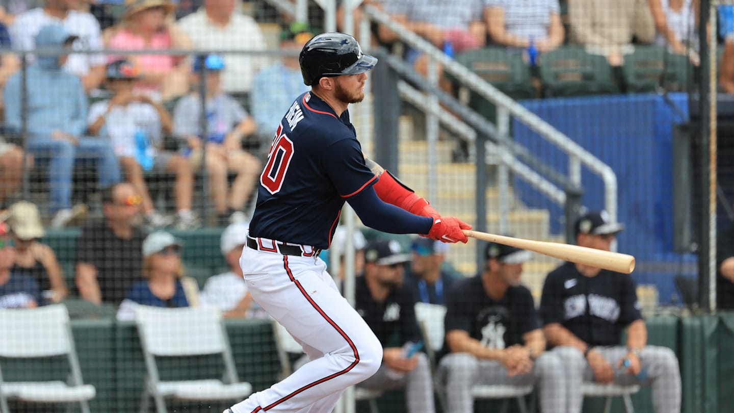 Mar 13, 2026; North Port, Florida, USA;  AAtlanta Braves catcher Jonah Heim (20) hits an RBI single during the first inning against the New York Yankees at CoolToday Park. Mandatory Credit: Kim Klement Neitzel-Imagn Images