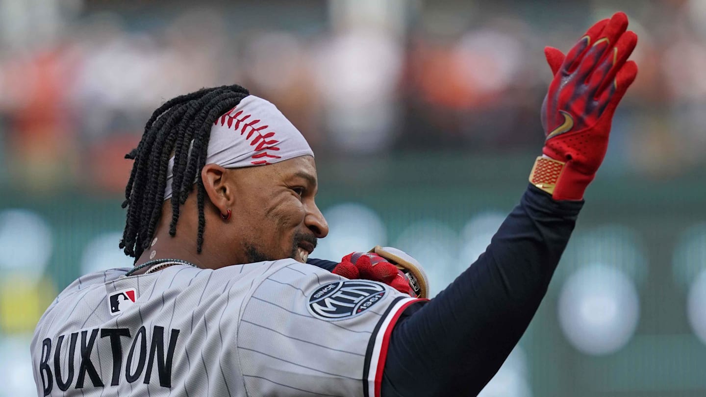 Mar 26, 2026; Baltimore, Maryland, USA; Minnesota Twins outfielder Byron Buxton (25) gestures towards teammates following his triple during the eighth inning against the Baltimore Orioles at Oriole Park at Camden Yards. Mandatory Credit: Mitch Stringer-Imagn Images