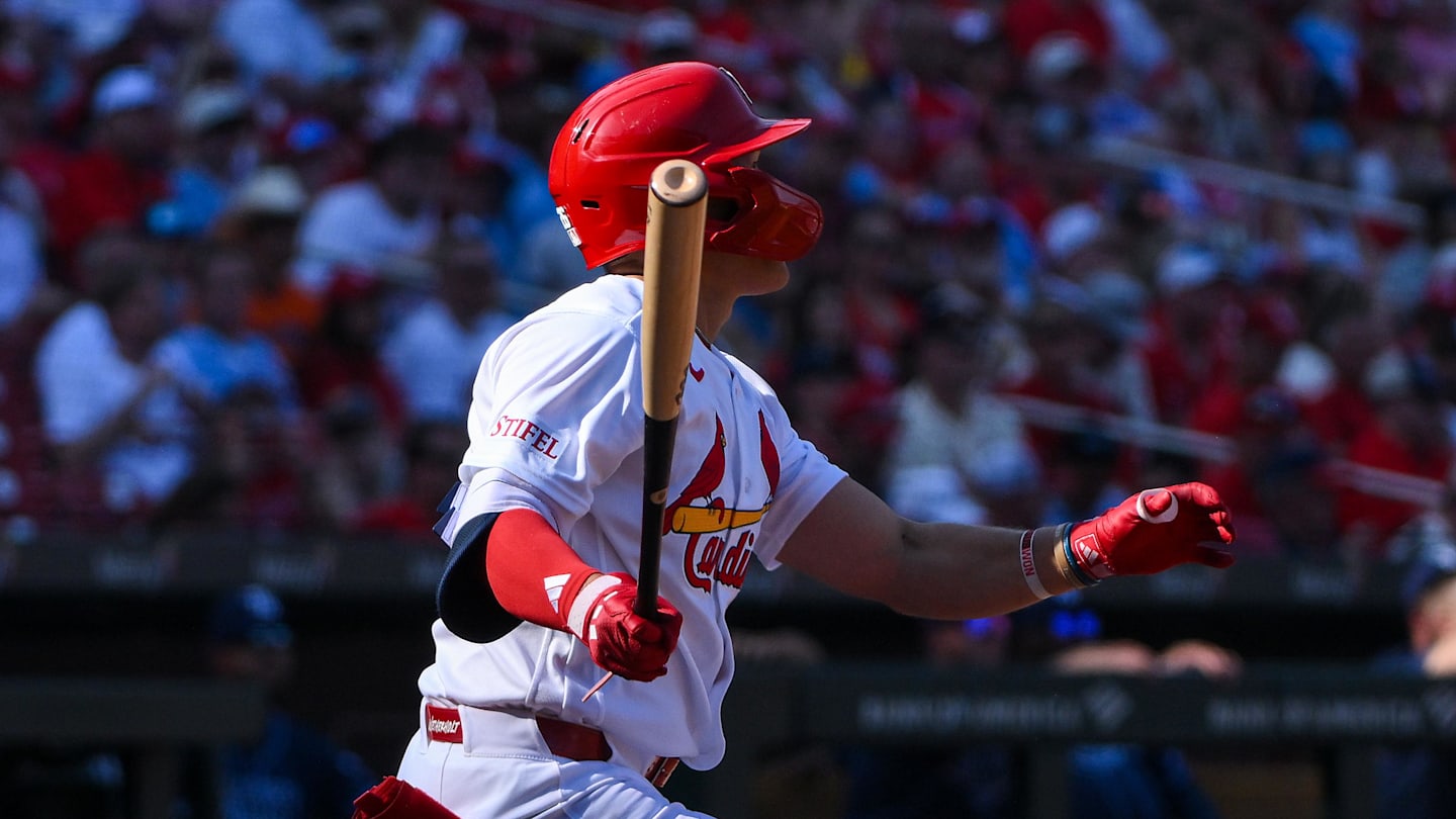 Mar 26, 2026; St. Louis, Missouri, USA; St. Louis Cardinals second baseman JJ Wetherholt (26) hits a solo home run for his first major league hit during his major league debut in the third inning against the Tampa Bay Rays at Busch Stadium. Mandatory Credit: Jeff Curry-Imagn Images