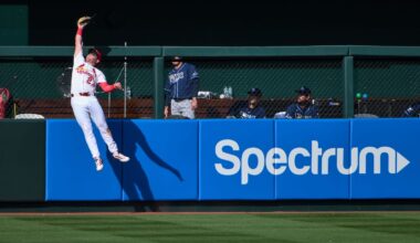 Mar 26, 2026; St. Louis, Missouri, USA; St. Louis Cardinals left fielder Nathan Church (27) leaps at the wall and robs a home run from Tampa Bay Rays left fielder Ryan Vilade (not pictured) during the fifth inning at Busch Stadium. Mandatory Credit: Jeff Curry-Imagn Images