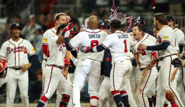 Mar 28, 2026; Cumberland, Georgia, USA; Atlanta Braves first baseman Dominic Smith (8) hits a walk-off grand slam against the Kansas City Royals in the ninth inning at Truist Park. Mandatory Credit: Mady Mertens-Imagn Images