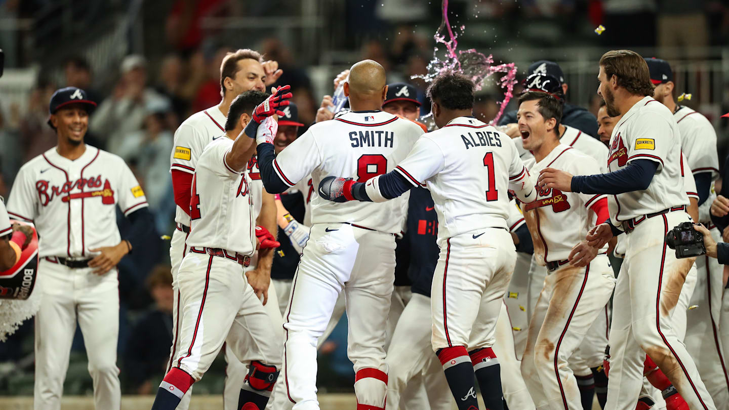 Mar 28, 2026; Cumberland, Georgia, USA; Atlanta Braves first baseman Dominic Smith (8) hits a walk-off grand slam against the Kansas City Royals in the ninth inning at Truist Park. Mandatory Credit: Mady Mertens-Imagn Images