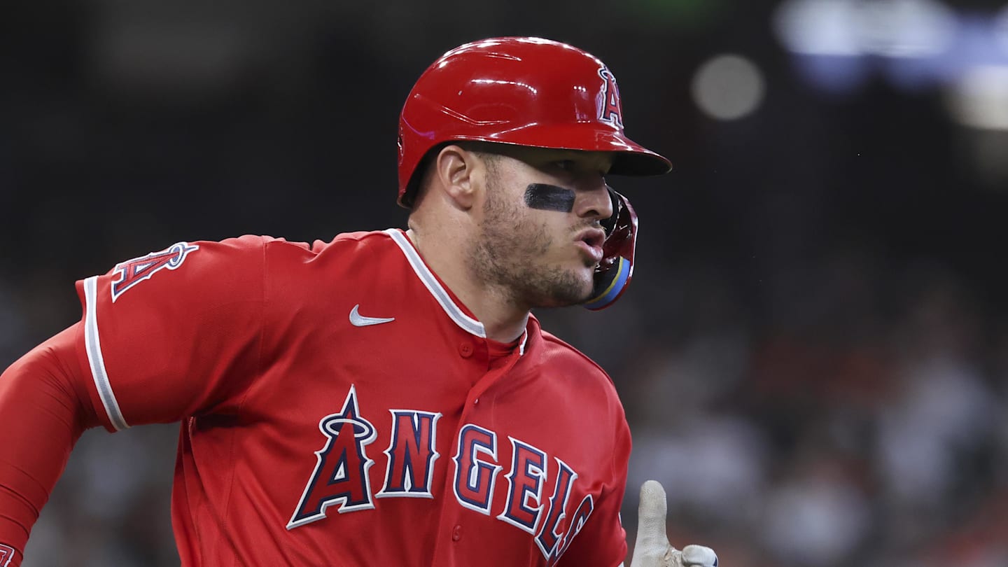Mar 29, 2026; Houston, Texas, USA; Los Angeles Angels designated hitter Mike Trout (27) runs to first base on a single during the third inning against the Houston Astros at Daikin Park. Mandatory Credit: Troy Taormina-Imagn Images
