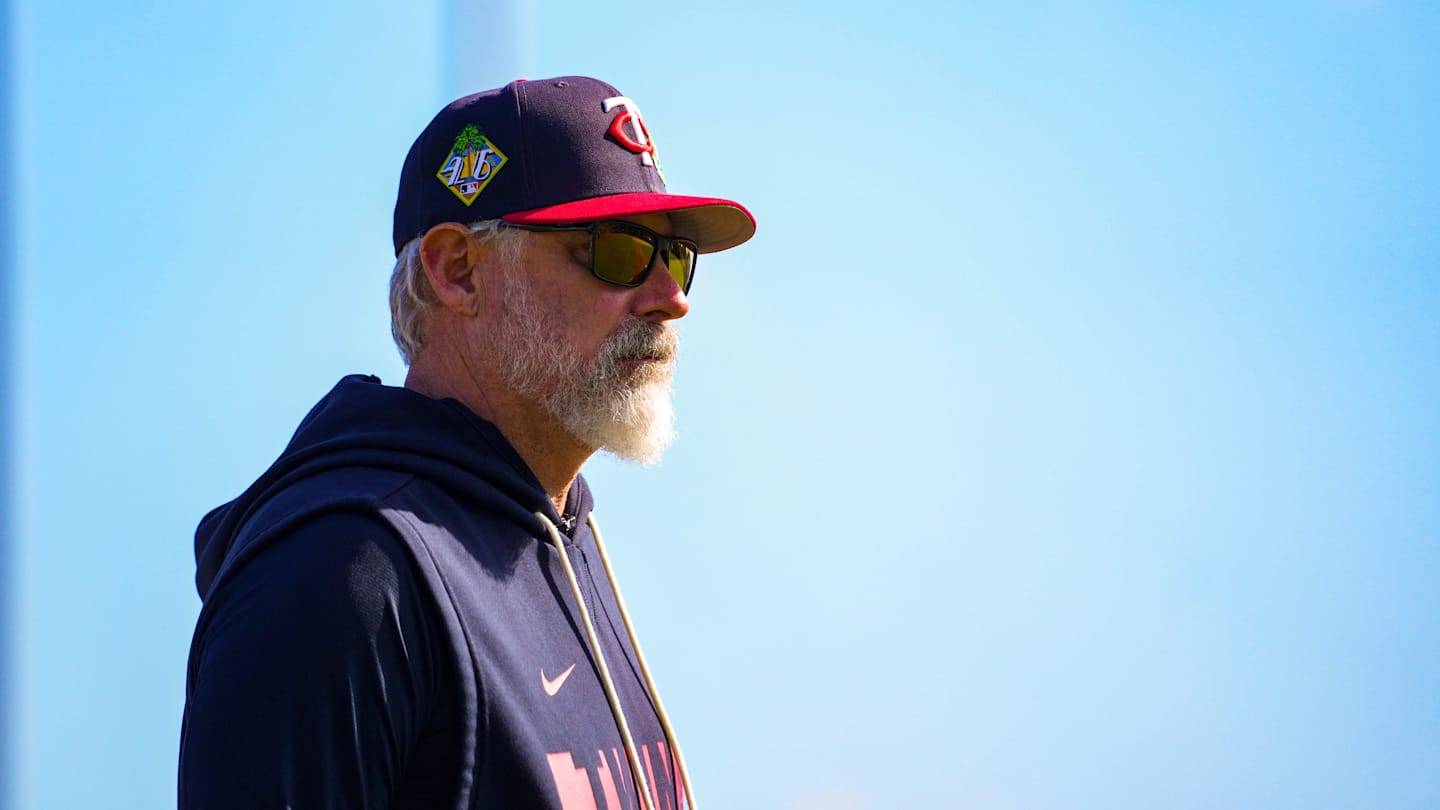 Manager Derek Shelton walks near the dugout during the Minnesota Twins first full-squad workout of spring training at Lee Health Sports Complex in Fort Myers, Fla., on Monday, Feb. 16, 2026.