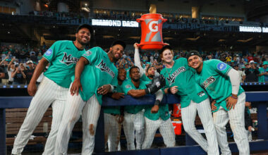 Mar 29, 2026; Miami, Florida, USA; Miami Marlins right fielder Owen Caissie (17) poses for a photo with pitcher Michael Petersen (49), first baseman Deyvison de Los Santos (63), second baseman Xavier Edwards (9), shortstop Otto Lopez (6), catcher Agustin Ramirez (50), and third baseman Javier Sanoja (8) after hitting a two-run walk-off home run against the Colorado Rockies during the ninth inning at loanDepot Park. Mandatory Credit: Sam Navarro-Imagn Images