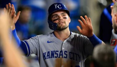 Sep 25, 2025; Anaheim, California, USA; Kansas City Royals second baseman Michael Massey (19) is greeted by teammates after scoring during the fifth inning against the Los Angeles Angels at Angel Stadium. Mandatory Credit: William Liang-Imagn Images