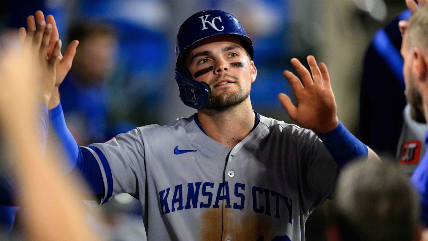 Sep 25, 2025; Anaheim, California, USA; Kansas City Royals second baseman Michael Massey (19) is greeted by teammates after scoring during the fifth inning against the Los Angeles Angels at Angel Stadium. Mandatory Credit: William Liang-Imagn Images