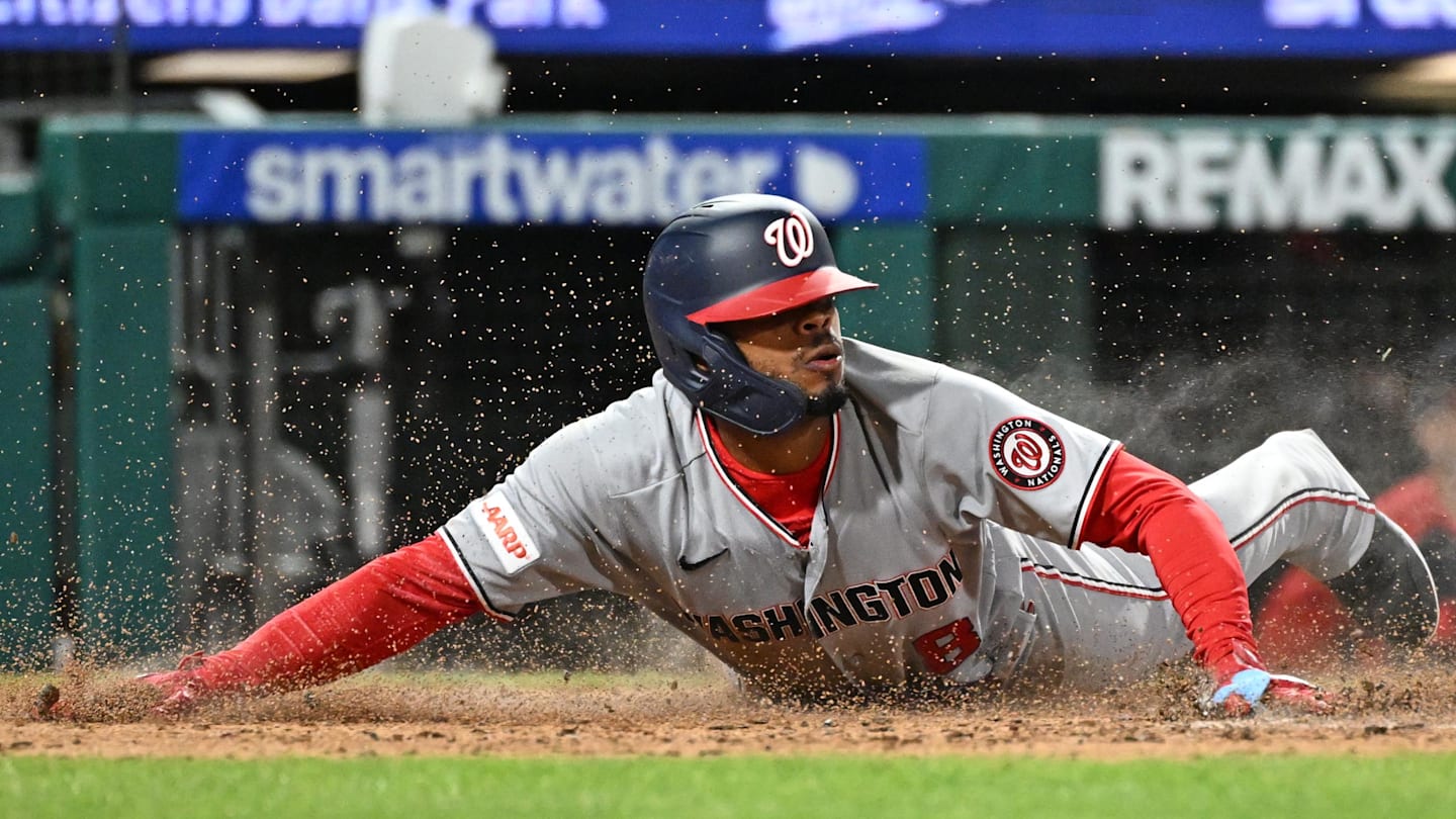 Mar 30, 2026: Washington Nationals third baseman José Tena (8) slides safely into home against the Philadelphia Phillies during the sixth inning at Citizens Bank Park.