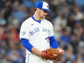 Toronto Blue Jays pitcher Brendon Little reacts after giving up a grand slam against the Athletics.