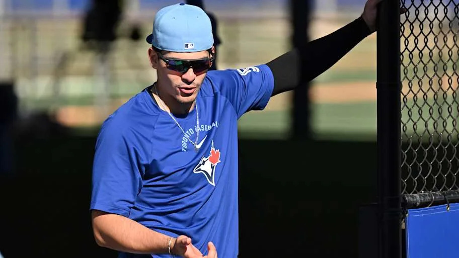 Brandon Valenzuela talking during batting practice for the Toronto Blue Jays. 
