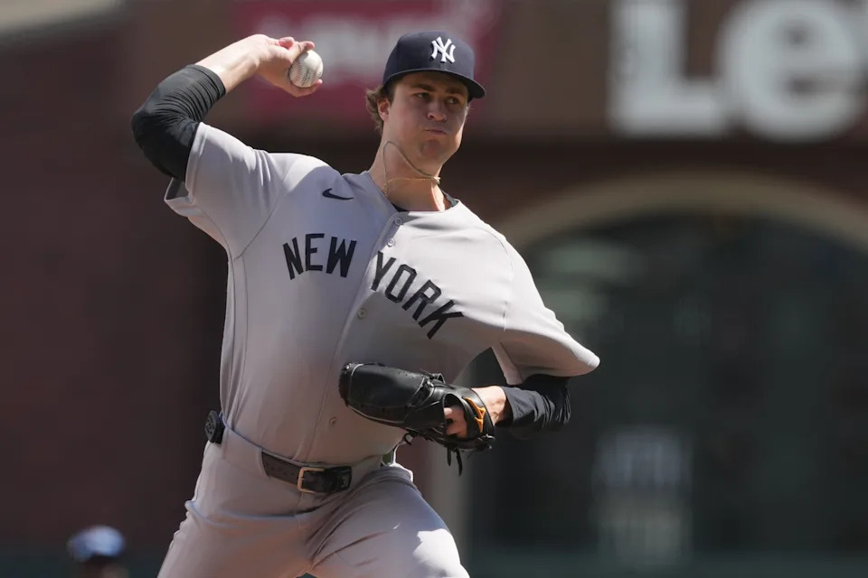 Mar 27, 2026; San Francisco, California, USA; New York Yankees starting pitcher Cam Schlittler (31) throws a pitch against the San Francisco Giants during the first inning at Oracle Park. Mandatory Credit: Darren Yamashita-Imagn Images
