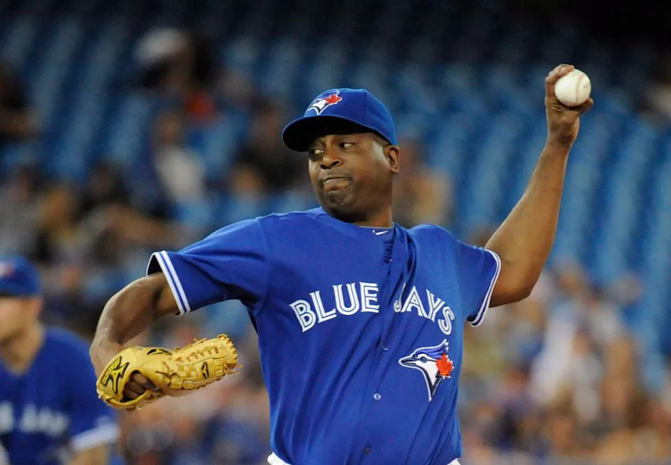 Toronto Blue Jays' Darren Oliver pitches against the Houston Astros during the ninth inning of their MLB baseball game Saturday July 27, 2013 in Toronto. THE CANADIAN PRESS/Jon Blacker