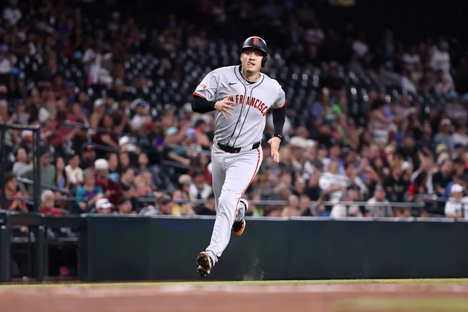 Wilmer Flores of the San Francisco Giants rounds third base to score a run against the Arizona Diamondbacks during the first inning at Chase Field on September 16, 2025 in Phoenix, Arizona. Getty Images