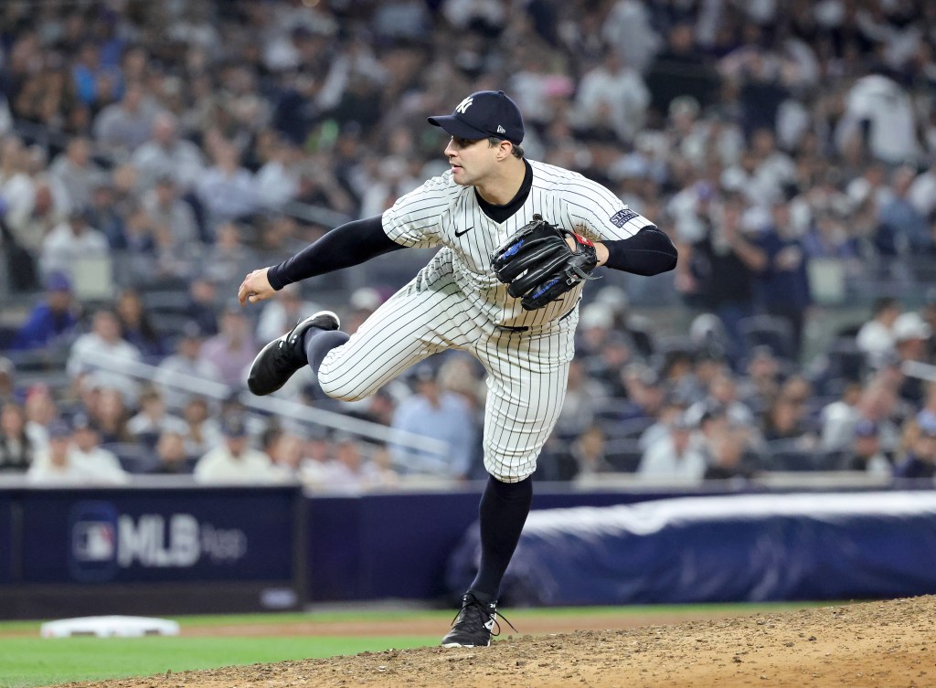 Tommy Kahnle pitching during the 2024 World Series for the Yankees.