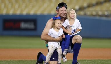 Scherzer celebrates with daughters Brooke and Kacey after a playoff win with LA in 2021
