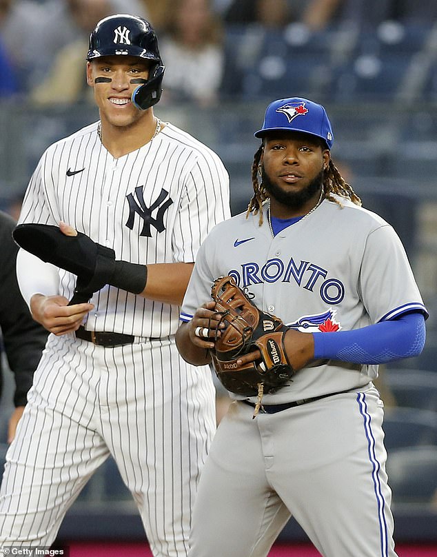 Yankees slugger Aaron Judge shares a laugh with Blue Jays star Vladimir Guerrero Jr.