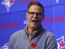 Toronto Blue Jays general manager Ross Aitkins speaks to the media at a press conference.