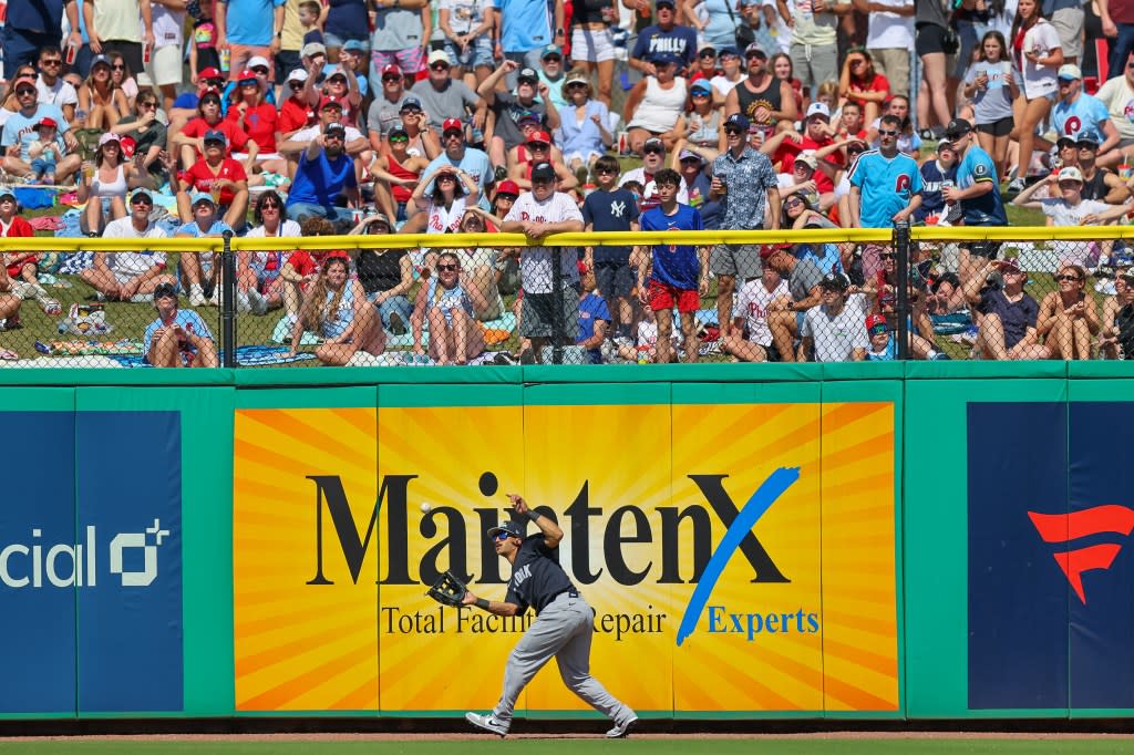 Trent Grisham #12 of the New York Yankees makes a catch on a fly ball from Dylan Moore #25 of the Philadelphia Phillies during the third inning of the spring training baseball game at BayCare Ballpark on March 1, 2026 Getty Images