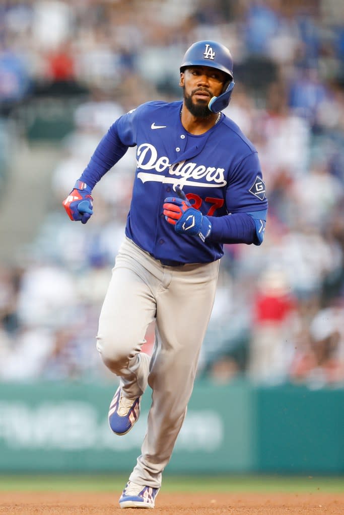 Los Angeles Dodgers left fielder Teoscar Hernandez rounds the bases after hitting a home run against the Los Angeles Angels during the third inning of a spring training baseball game, Sunday, March 22, 2026, in Anaheim, Calif. AP