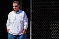 Texas Rangers president of baseball operations, Chris Young watches during a spring training...