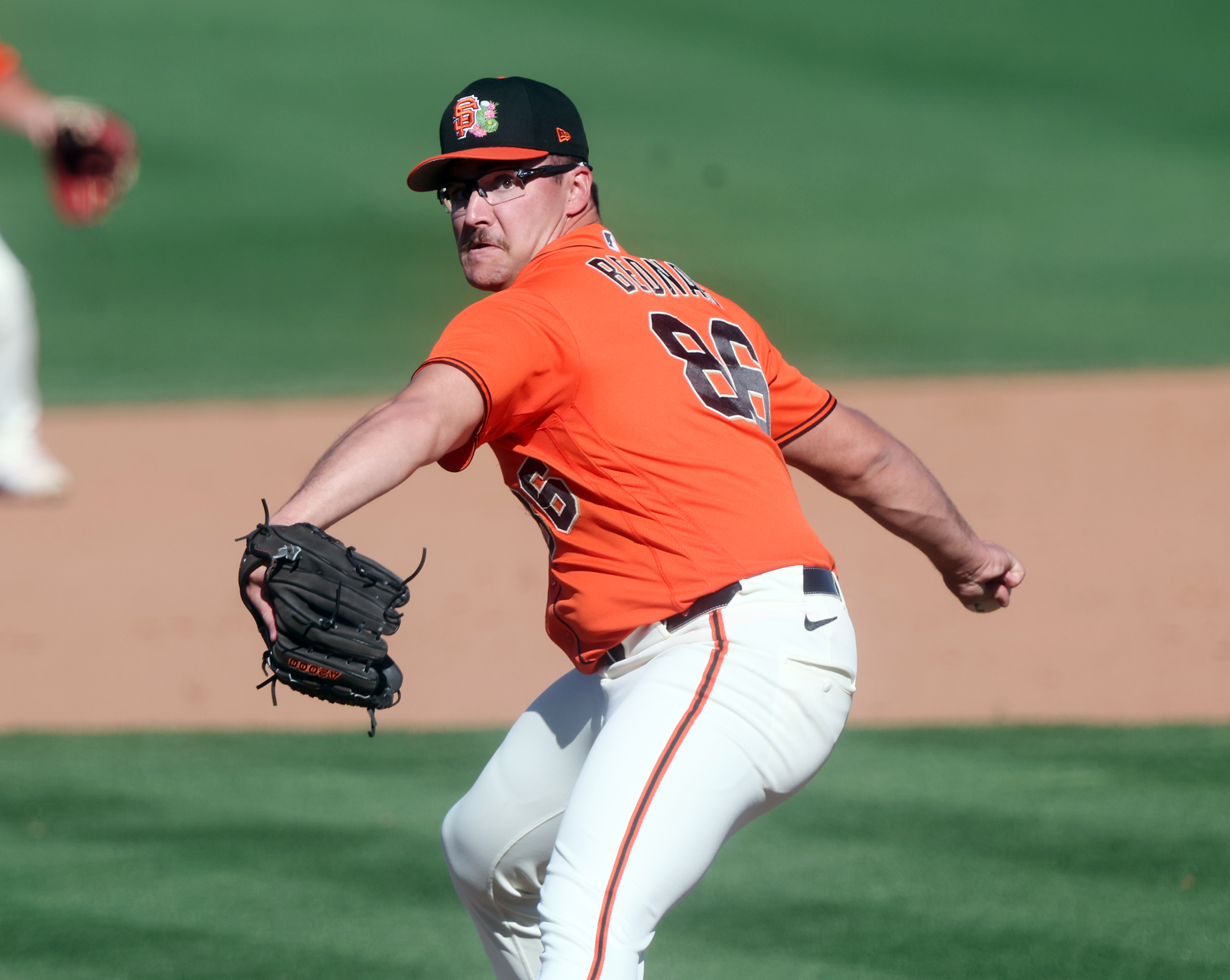 San Francisco Giants pitcher Will Bednar #86 delivers a pitch...
